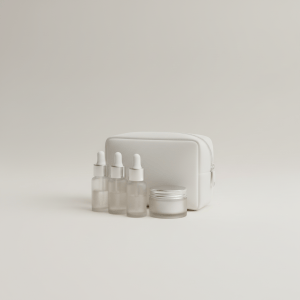 Professional e-commerce product photography of a **brandless** Peptide Serum Travel Kit (Compact peptide serum set ideal for on the go wellness routines.). The entire environment is a perfectly uniform, flat, solid color #EAE9E7 (light warm gray) with absolutely no gradient, vignette, spotlighting, texture, noise, or grain. The object is centered and tiny, occupying only 25% of the frame, surrounded by massive negative space. The background and floor are a seamless, infinite cyclorama of solid color #EAE9E7 with no horizon line, no corner, and no visible wall/floor transition. Lighting: ultra-even high-key with very strong global illumination and soft, multi-directional bounced fill (studio light tent look). Bright exposure (lifted midtones and shadows, low contrast), slightly overexposed overall while preserving product detail. Fully diffuse, no hard shadows, no cast shadows; at most a barely visible neutral contact shadow. No harsh specular highlights. Framing: simple 3/4 view. Perfectly centered. Style: ultra-clean, minimalistic. No logos, no text, no distractions. 8k resolution, sharp details on the object.